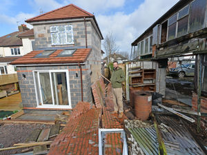 Supporting image for story: Storms bring wall crashing down into Wolverhampton family's new extension