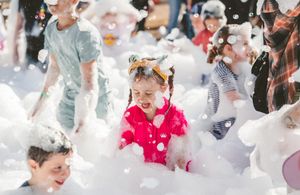 Children enjoy the Farmarama foam party