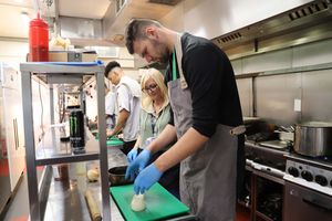 Josh preparing food at the White Horse in Shrewsbury. Pic: Derwen College