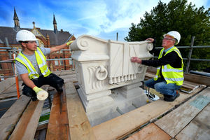 Site manager Ron Graham, right, with his grandson Luke working on the very top of the cenotaph