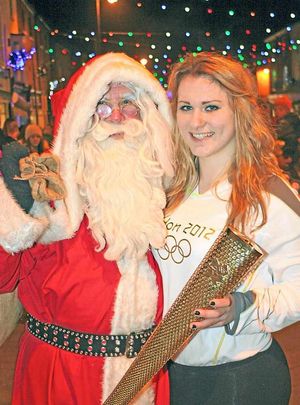 Olympic torch bearer Adele Nicoll joins the fun at Welshpool. Picture: Andrew Charman