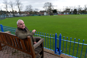 John Calvert sits in the cricket ground