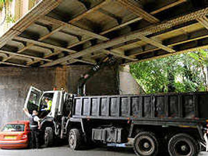 Supporting image for story: Man's £350 fine for crane collision