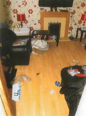 Inside the lounge of the family home, in a new picture released by police today