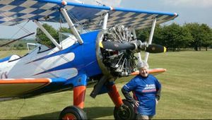Christine Grundy completed an aerobatic wing walk stunt to raise funds for charity. Picture: Age UK.