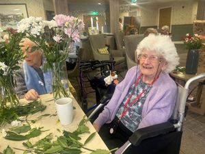 Resident at HC-One’s Priorslee House Care Home flower arranging