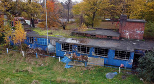 Wrecked changing rooms at the site