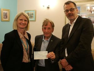 Shrewsbury Severn Rotary Club president David Morris (centre) presents a cheque for £1,000 to Nicky Green, Severn Hospice senior community fundraiser Nicky Green, watched by Mark Drew. 