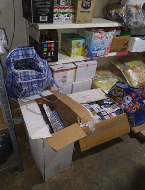 Boxes of illicit cigarettes seized from another city premises during raids by Trading Standard officers