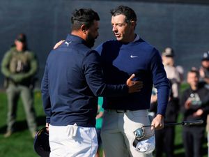 Rory McIlroy and JJ Spaun