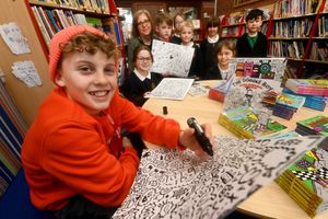 Doodle Boy Joe Whale at Radbrook Primary School for World Book day - with him is teacher Sue Brady, Poppy, 10, Dougie, 6, Josh, 7, Arthur, 5, Hattie, 5, Willow, 9 and Harvey, 6