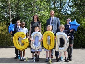 
Photo caption: Headteacher, Dominic Simpson (Right) and Georgie Golden, Assistant Headteacher (Left) celebrate with pupils at Tenterfields Primary Academy.