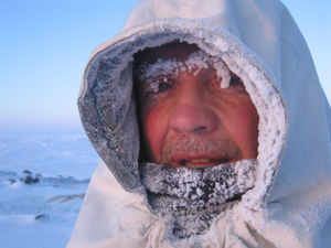 Wildlife cameraman Doug Allan with frozen face while filming polar bears at minus 35 degrees C in Kong Karl's Land, Svalbard, Norwegian Arctic, March 2005