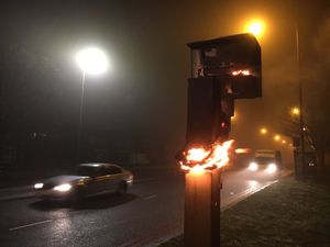 Supporting image for story: Redundant speed camera destroyed by arsonists' tyre fire