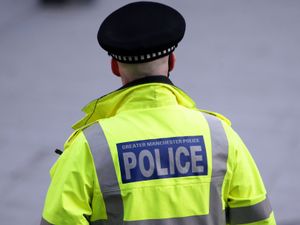 A stock image of a police officer from Greater Manchester Police.