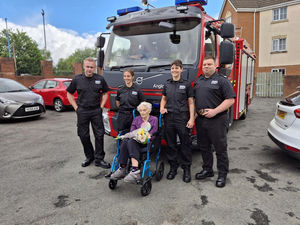 Resident, Irene Weaver at HC-One’s Roxburgh House Care Home with local fire service