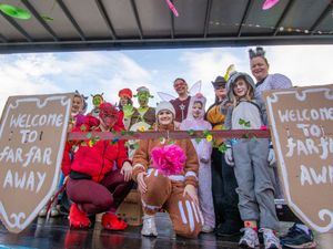 Supporting image for story: Santa, Shrek and Minions take to the streets of Oswestry as thousands enjoy Christmas parade