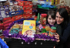 Sean Coady with his mum Kate at the foodbank