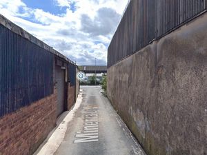 Supporting image for story: Suspect still at large after man is shot while walking in Wolverhampton