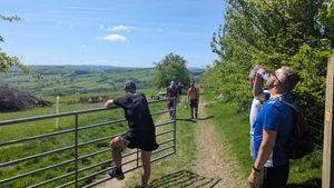 The Hopeful Hikers take in the views of the Shropshire Hills during their trek.