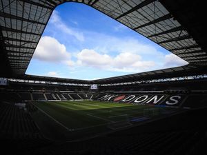 Supporting image for story: Football fan banned from all UK matches after throwing 'pyro device' onto pitch during Wrexham match