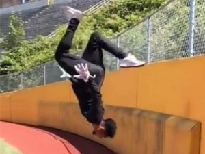 Supporting image for story: Watch as athlete performs an amazing trick with an American football