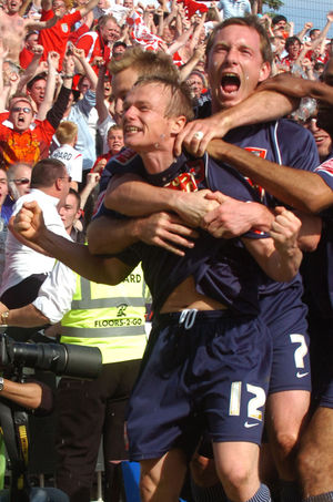 Dean Keates celebrating his title-winning strike for Walsall in 2007.