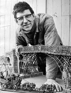 Gerry Foxall with a model of the Iron Bridge he made out of scrap, pictured in March 1975. It was with this 5ft model that he won the title of Britain's first 'Master of Scrap Art' later in 1975