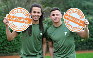 Walsall FC players Callum Cockerill-Mollett and Kory Roberts visited Acorns Hospice, Walsall, to show their support for the campaign to keep the hospice open