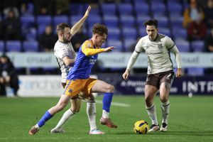 Tommy McDermott of Shrewsbury Town and Jamie Walker of Grimsby Town