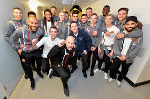 Pharmacy staff and big Walsall fans: Scott Nicklin and Mark Rainer with the lads
