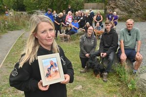 Walking in memory of Lily-May Vaughan were her mum Leanne, brother Travis, 17, headteacher Stuart Ayres and her dog Sadie. Many more of Lily-May's friends and family pictured in the background also took part