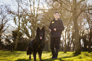 Two-year-old Soot is pictured with his carer Becky Rogers