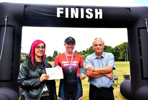 Winner in the 400m swim and 5k run Female 19-39 - Emma Colwill with Maya Kluge and Deputy Mayor Councillor Alan Waller. Image by Ted Edwards Photography