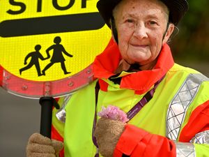Supporting image for story: Family of much-loved Wolverhampton lollipop lady who was always ‘armed with sweets' stop funeral procession to hand chocolates out to tribute payers