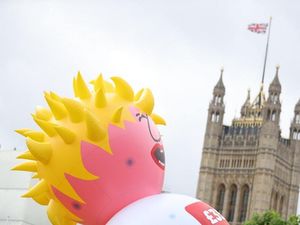 Supporting image for story: In Pictures: Anti-Brexit protesters float Boris Blimp outside Parliament