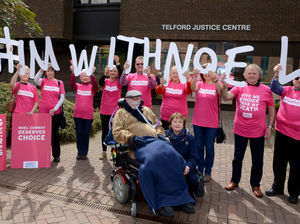 Noel Conway at Telford County Court with his wife Carol and supporters
