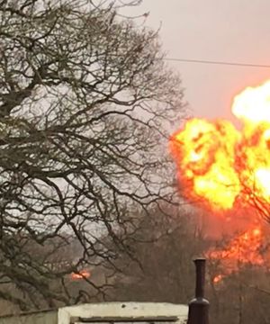 Fireball erupts into the sky after the explosion at the barn near Kingsnordley. Photo: Claire Ashmore