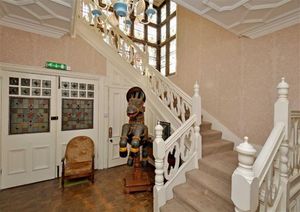 The staircase when the house was sold