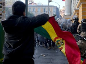 Supporting image for story: Military flees Bolivia government palace after coup attempt fails