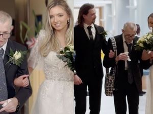 Maurice Haynes walks his daughter down the aisle at St Giles Hospice in Whittington, Shropshire.