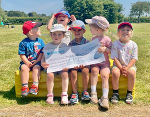 Pupils celebrate the donation.