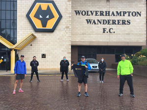 Supporting image for story: Running man Nathan clocks up miles on trip round the grounds