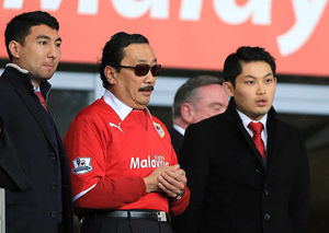 Vincent Tan (centre) in the stands
