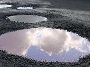 Supporting image for story: Thousands paid in pothole claims