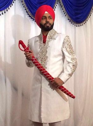 Bachitar Singh Boparai's special wedding suit with Wolves logo