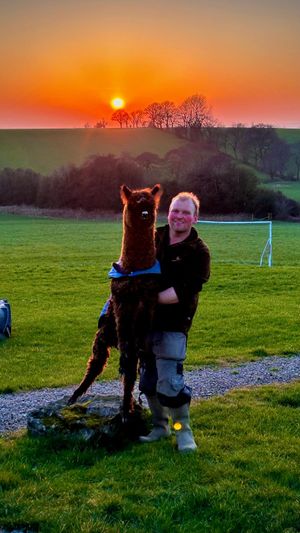 Owner Scott with Rikki the rescued Alpaca 