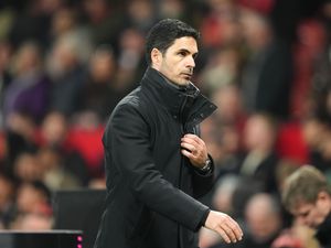 Mikel Arteta walks off the pitch after Arsenal's draw at Old Trafford