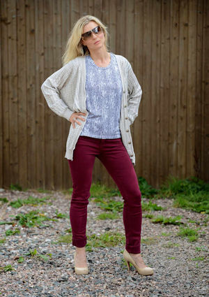Lisa Williams models top label clothes donated by WBA keeper Ben Foster at Women's Aid charity shop, Solihull