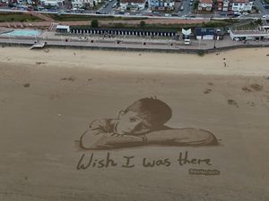 Supporting image for story: Huge sand artwork highlights how child poverty means millions miss out in summer